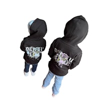 two children wearing a black hoodie with their names on it