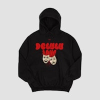 a black hoodie with two faces on it